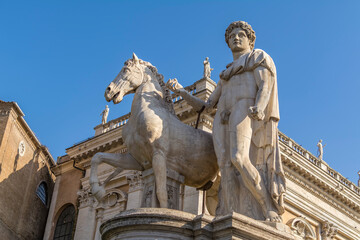 Fototapeta na wymiar Statue of Castor and a horse in the Piazza del Campidoglio on the Capitoline Hill in Rome, Italy