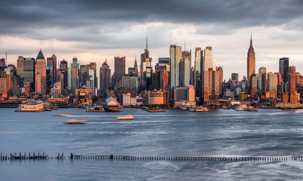 Manhattan Skyline Panorama Along The Hudson River At Sunset, New York City, USA