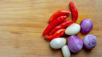 seasoning consisting of onion, garlic, lemongrass and chili in a plate on the table