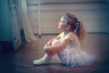 Funny little ballerina in tutu. Image with selective focus, toning and noise effect. - obrazy, fototapety, plakaty