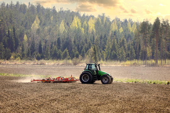 Deutz-Fahr Tractor and Harrow Field Landscape