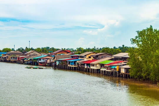 Don Sak houses by the water in Surat Thani Thailand.