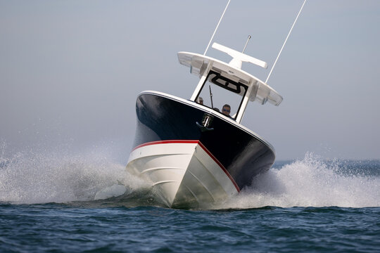 Center Console Boat Approaching Head-on In A Sharp Turn.