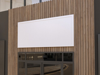 Mockup of an empty signboard on a street building