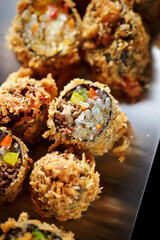 Fried vegetable rolls on a plate 