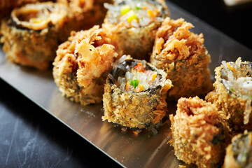 Fried vegetable rolls on a plate 