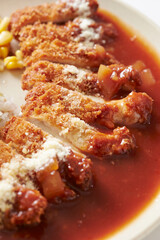 Pork cutlet with delicious sauce on a plate