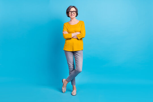 Full Length Body Size View Of Attractive Cheerful Content Woman Posing Folded Arms Isolated Over Vivid Blue Color Background