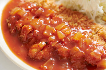 Pork cutlet with delicious sauce on a plate