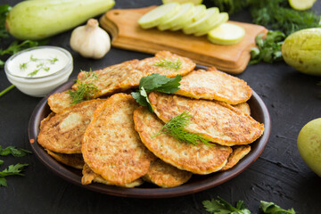 A healthy breakfast of zucchini pancakes. Creative atmospheric decoration