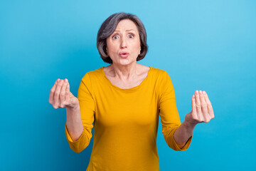 Portrait of attractive mad outraged woman saying pretense claim isolated over bright blue color...