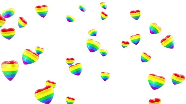 Realistic looping 3D animation of the flying rainbow LGBT pride or gay pride flag hearts rendered in UHD with alpha matte