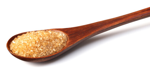 yellow sugar in the wooden spoon, isolated on white