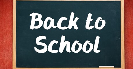 Obraz premium Composition of back to school text over black chalkboard