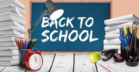 Composition of back to school text and school items