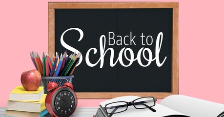 Composition of back to school text and school items