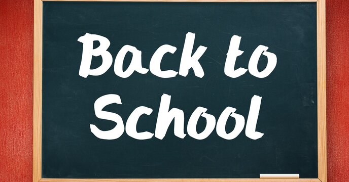 Composition of back to school text over black chalkboard