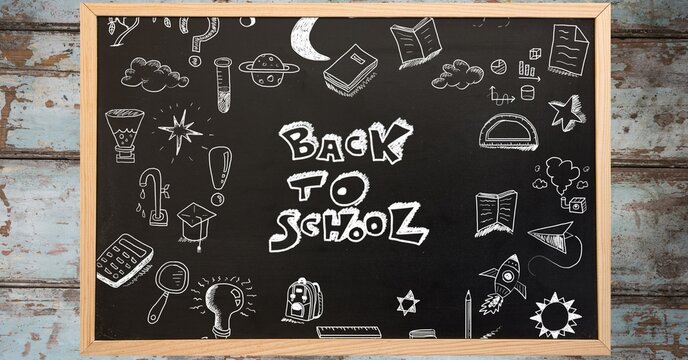 Composition of back to school text and school items over black chalkboard