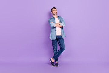 Fototapeta na wymiar Full length body size photo man smiling confident crossed hands dreamy isolated pastel violet color background