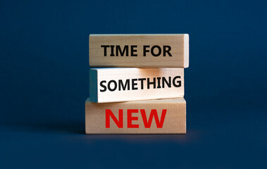 Time for something new symbol. Wooden blocks with words 'Time for something new' on beautiful grey...