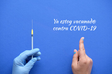 Spanish text Ya estoy vacunado contra COVID means I got my COVID 19 vaccine in English. Vaccination...