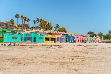 Colored houses near the coast in the city of Capitola. Summer day by the ocean. Capitola, USA - 19 Apr 2021