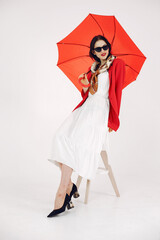 Girl in a fashion image on a white background