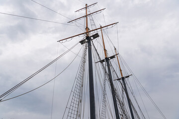 Details of mast and rigging on tall ship moored in Toronto's  Inner Harbour, shot on a summer...