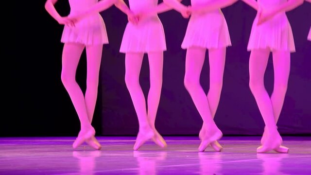 Young ballerinas are dancing 'Pizzicato'.