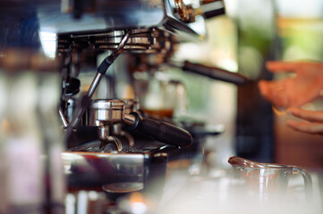 Fototapeta na wymiar espresso machine pouring espresso