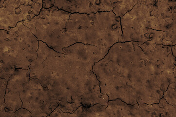 dark background texture brown soil in cracks