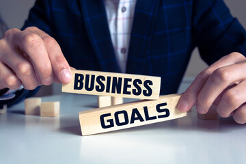 Obraz premium business GOAL word written on wood block.