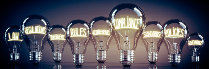 Compliance, regulations, rules, policies - shining light bulbs - 3D illustration