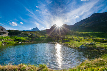 sunset over the alpin lake in the alps (near Ischgl, Tyrol, Austria)