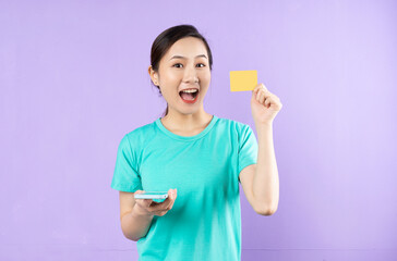 beautiful asian woman portrait, isolated on purple background