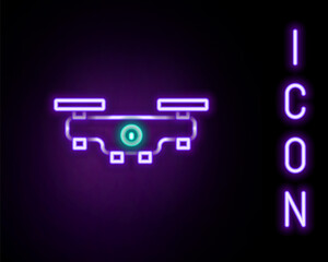 Glowing neon line Drone flying icon isolated on black background. Quadrocopter with video and photo camera symbol. Colorful outline concept. Vector