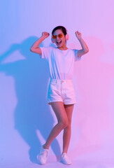 Young Asian woman doing exercise on white background