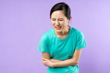 beautiful asian woman portrait, isolated on purple background