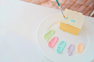 White cake with painted on white background,DIY cake,.dessert