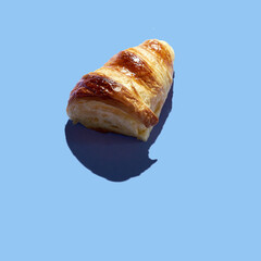 Bakery products cutted croissant minimal background. Delicious and food concept.