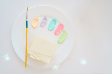 White cake with painted on white background,DIY cake,.dessert