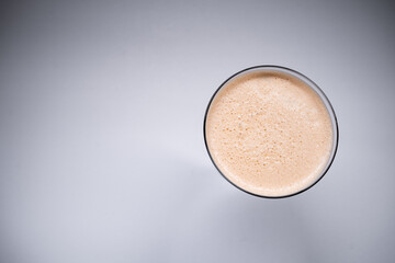 top view of espresso martini cocktail or coffee drink on white background