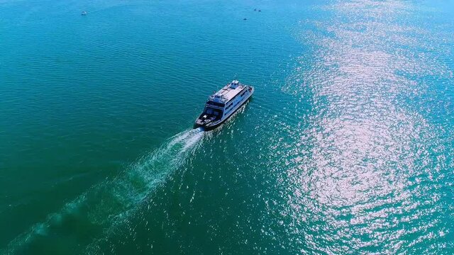 Aerial shot of a ferry sailing on Lake Zurich near Horgen, Switzerland, top view