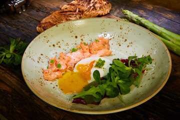 Slow Cooked Salmon fillet steak with salad on plate, Sous-Vide Cooking Salmon Fish