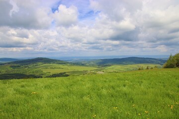 Fototapeta na wymiar A view to the landscape with mountains, forests and meadows at White Carpathians, Czech republic