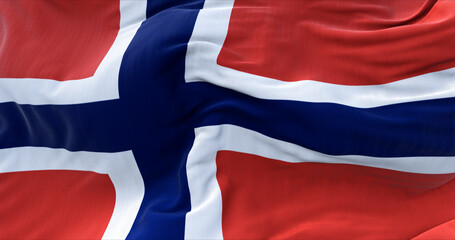 Detail of the national flag of Norway flying in the wind.