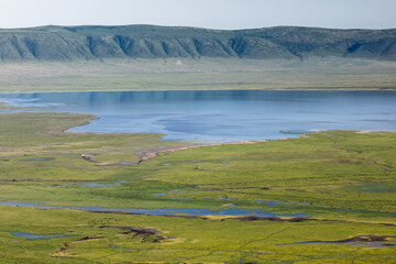 Elevated view of Lake Magadi and crater floor Ngorongoro Crater Tanzania Africa 