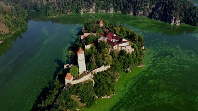 Zvikov castle is a well-preserved Gothic castle standing on a rock above the confluence of the Vltava and Otava rivers. It is considered one of the most beautiful medieval buildings in the Czech