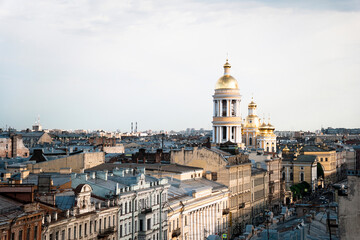 Obraz premium Cityscape view over the rooftops of St. Petersburg. View of the rooftops against the sky