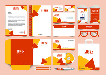 Stationery Corporate Brand Identity Mockup set with red and yellow abstract geometric design. Business stationary mockup template of Guide, annual report cover, brochure, bag, corporate Letterhead.
